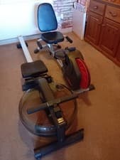 V-Fit VR1 Water Resistance Rowing Machine Adjustable Seat Black/Red 100kg